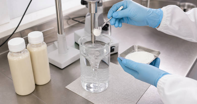 CMC powder being dispersed during a controlled protein beverage hydration trial