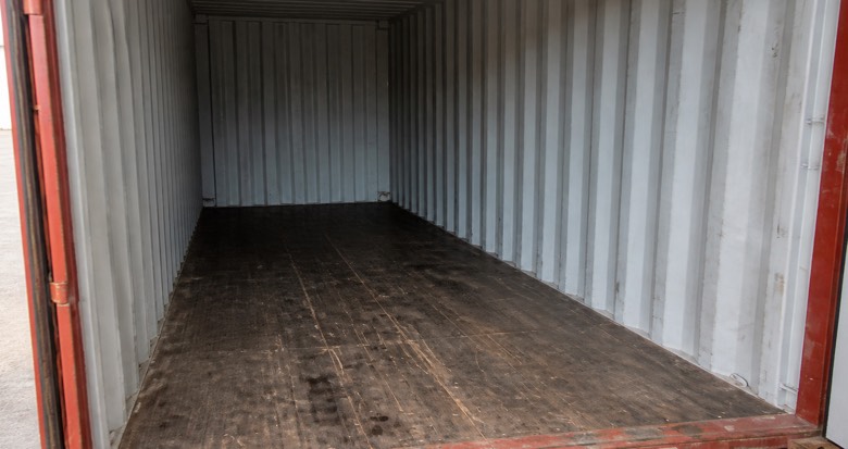 Empty freight container interior prepared for a dry-condition inspection